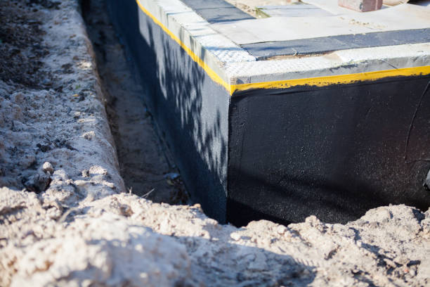 Professional Waterproofing technician working in Geneva, AL